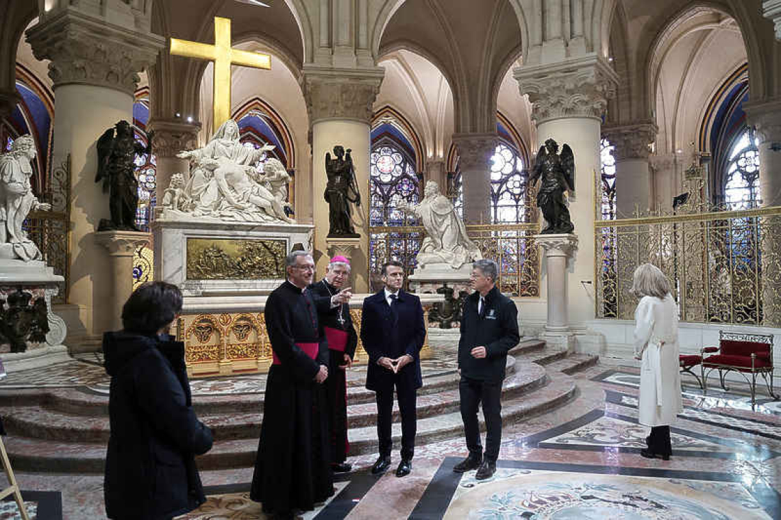 Macron lauds artisans for restoring  the Notre-Dame Cathedral in Paris